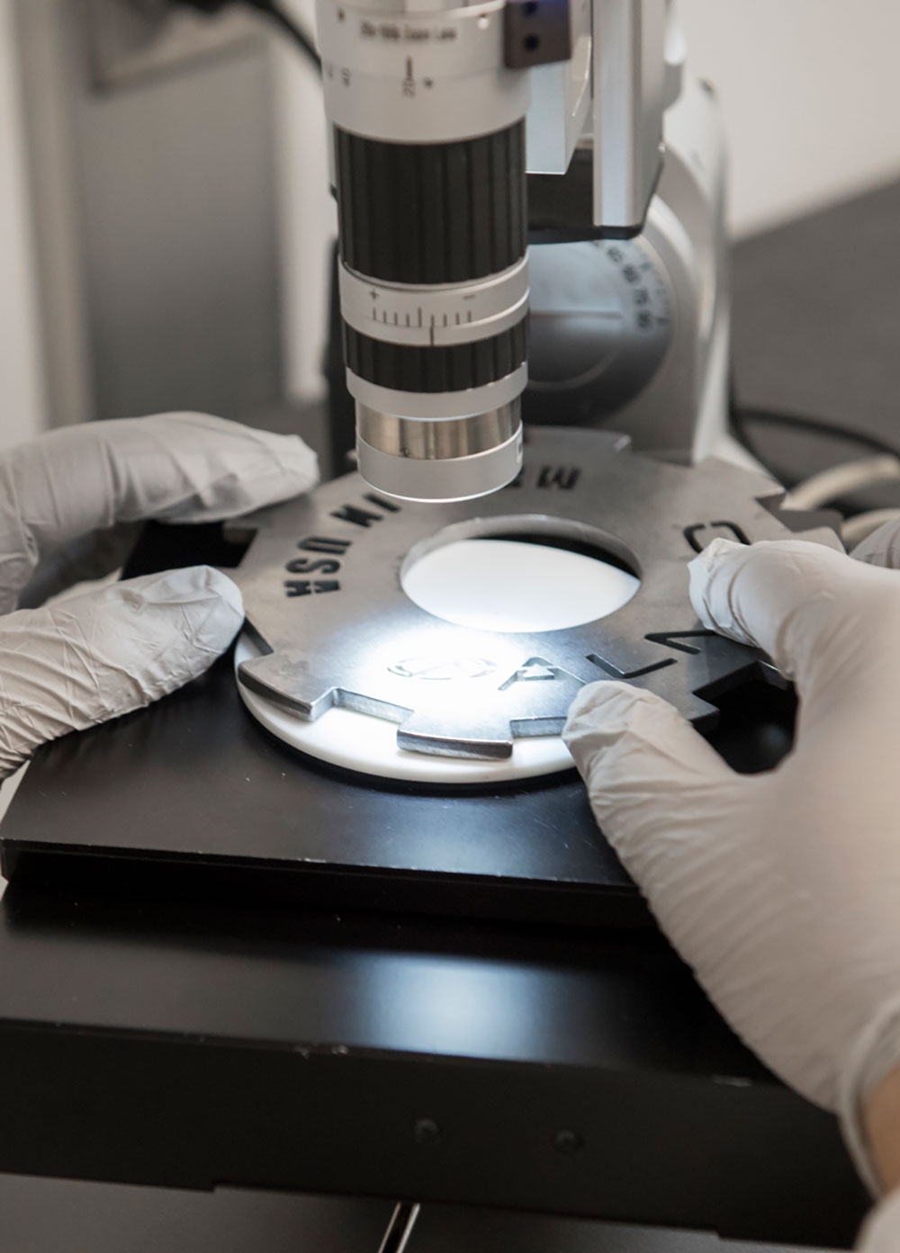 Employee checking part in Process Lab