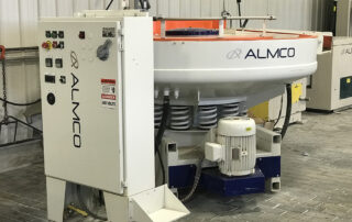 Round bowl vibratory deburring equipment.