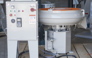 Round bowl vibratory polishing equipment.