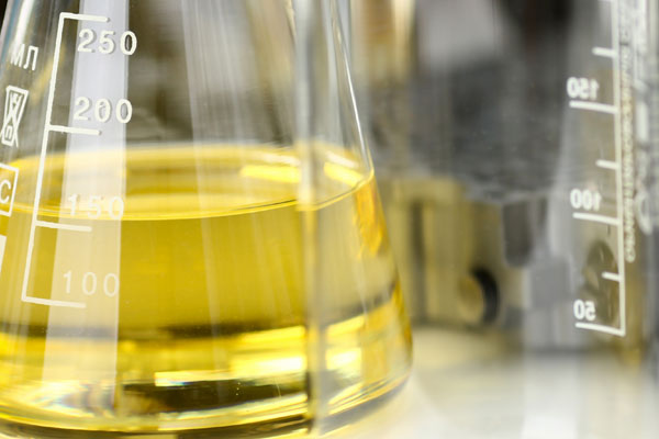 Liquid-Header Industrial liquid compound in a glass beaker.