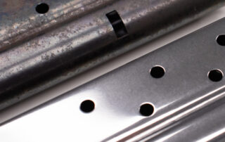 Before and after shot of firearms parts.