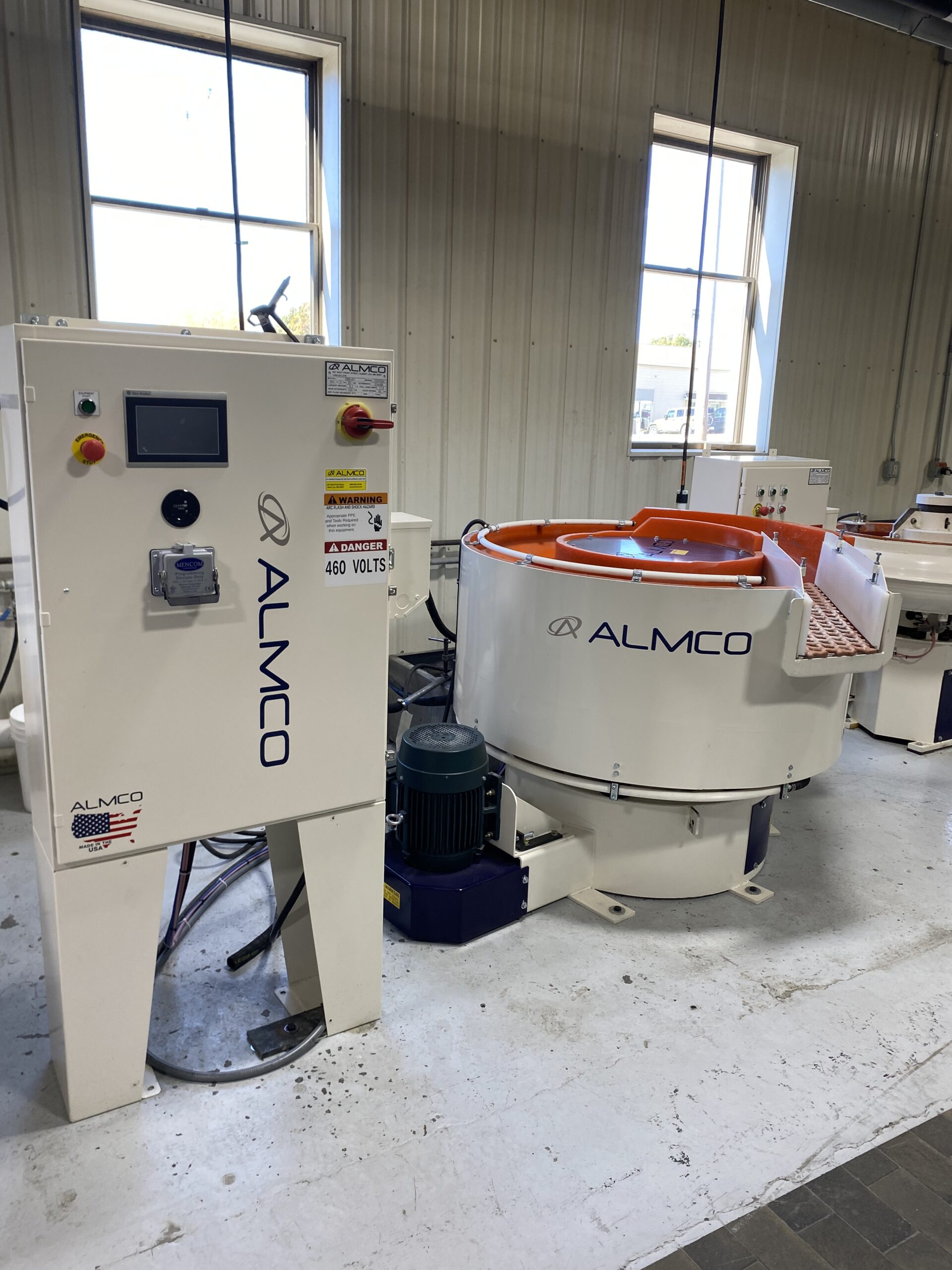 SBB-8V A vibratory tumbling bowl with internal separation feature and 8 cubic feet of capacity.