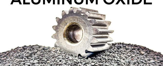 a gear used in aerospace manufacturing has been deburred using aluminum oxide abrasives