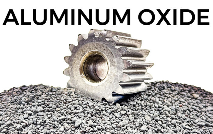 a gear used in aerospace manufacturing has been deburred using aluminum oxide abrasives